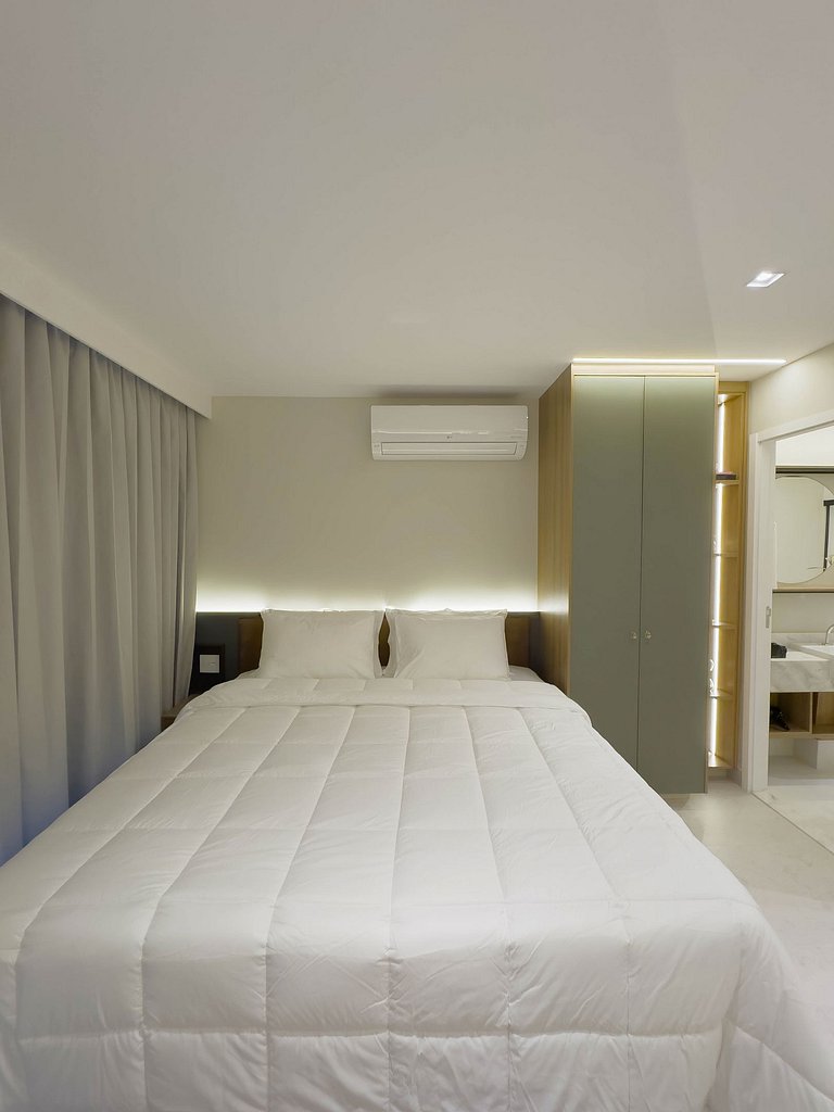 FR1605A Estúdio moderno com cama king e garagem